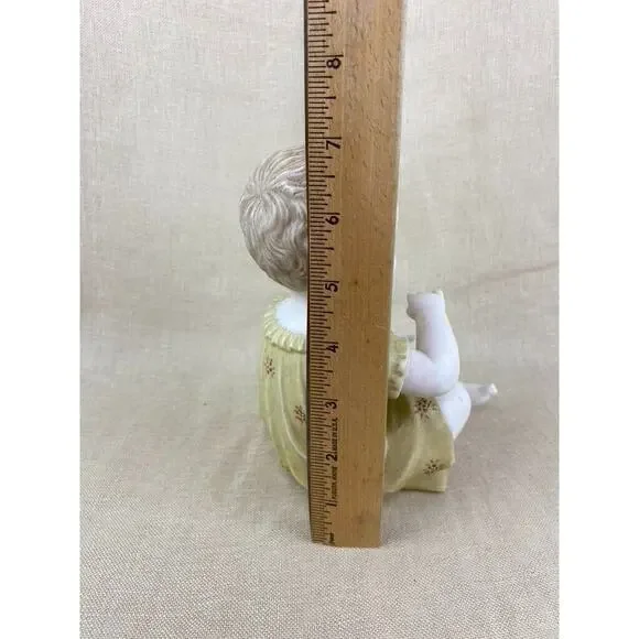 Vintage Bisque Porcelain Piano Baby Figurine 7”